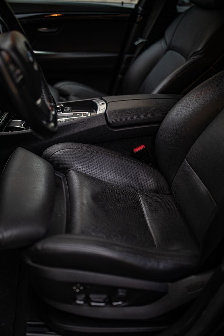 Spotless black leather seats after an interior deep clean